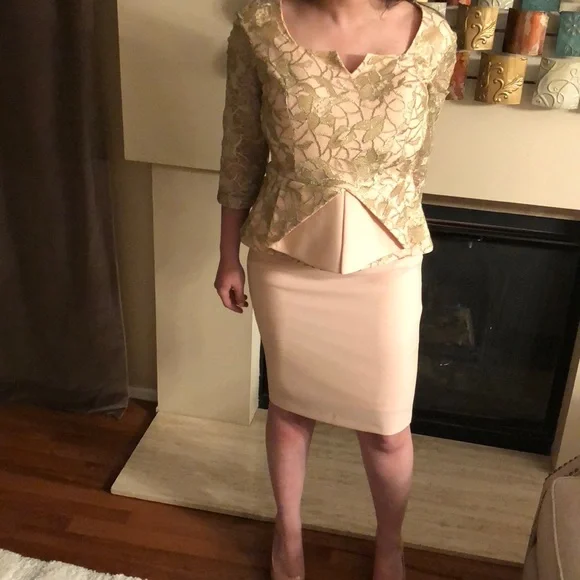 Elegant Cream Lace Peplum Dress - Picture 1 of 7